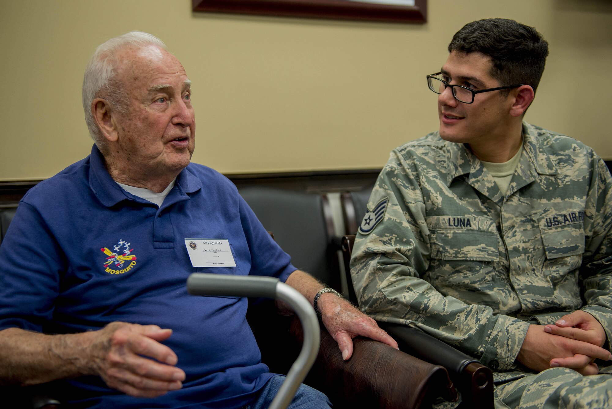 Korean War veterans of the 6147th Mosquitos met with Col. Laura Lenderman, 375th Air Mobility Wing Commander, and Scott Air Force Base Airmen to share their military experiences, Aug. 26, 2016, Scott AFB, Illinois. The Korean War Mosquitos visited Scott to learn about the present day Air Force and the installation, and the members shared their many stories about their jobs and missions as radio operators and pilots during the Korean War. (U.S. Air Force photo by Senior Airman Joshua Eikren)