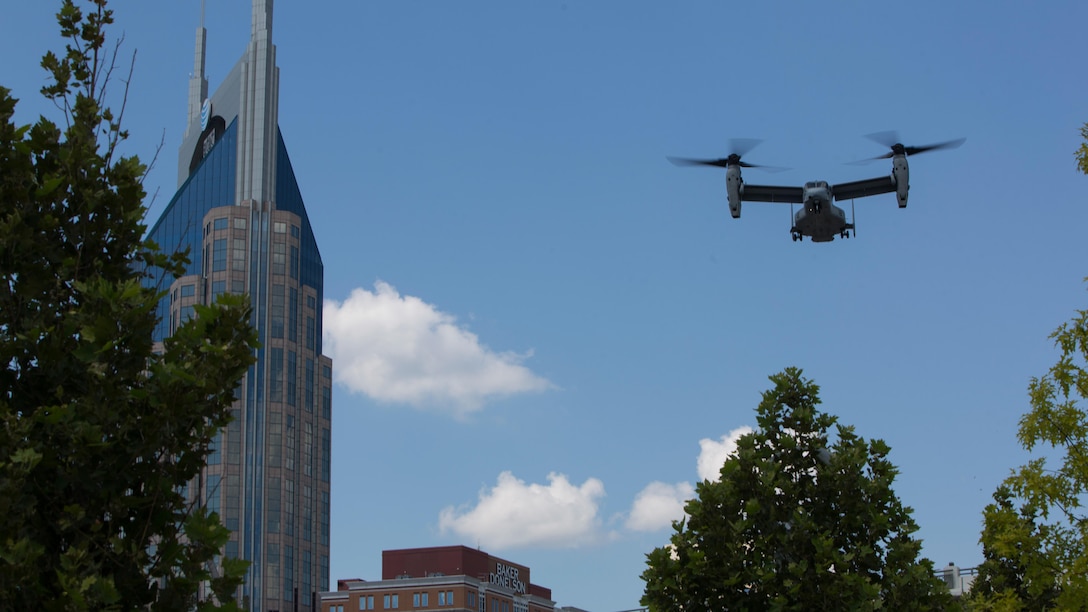 An MV-22B Osprey with Marine Medium Tiltrotor Squadron 261, 2nd Marine Aircraft Wing, flies over the city of Nashville, Tenn., as part of Marine Week Nashville, Sept. 6, 2016. Marine Week Nashville is an opportunity to showcase the Marines and help people understand the capabilities of the Marine Corps. (U.S. Marine Corps photo by Lance Cpl. Alexis C. Schneider/ Released)