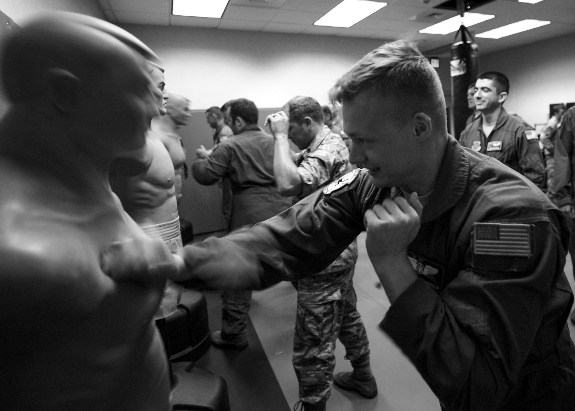 U.S. Air Force Senior Airman Dustin Thomerson, 41st Airlift Squadron C-130J loadmaster, demonstrates self-defense tactics June 21, 2016, at Little Rock Air Force Base, Ark. All aircrew members learn basic self-defense measures to prevent death or severe injury. (U.S. Air Force photo by Senior Airman Harry Brexel)