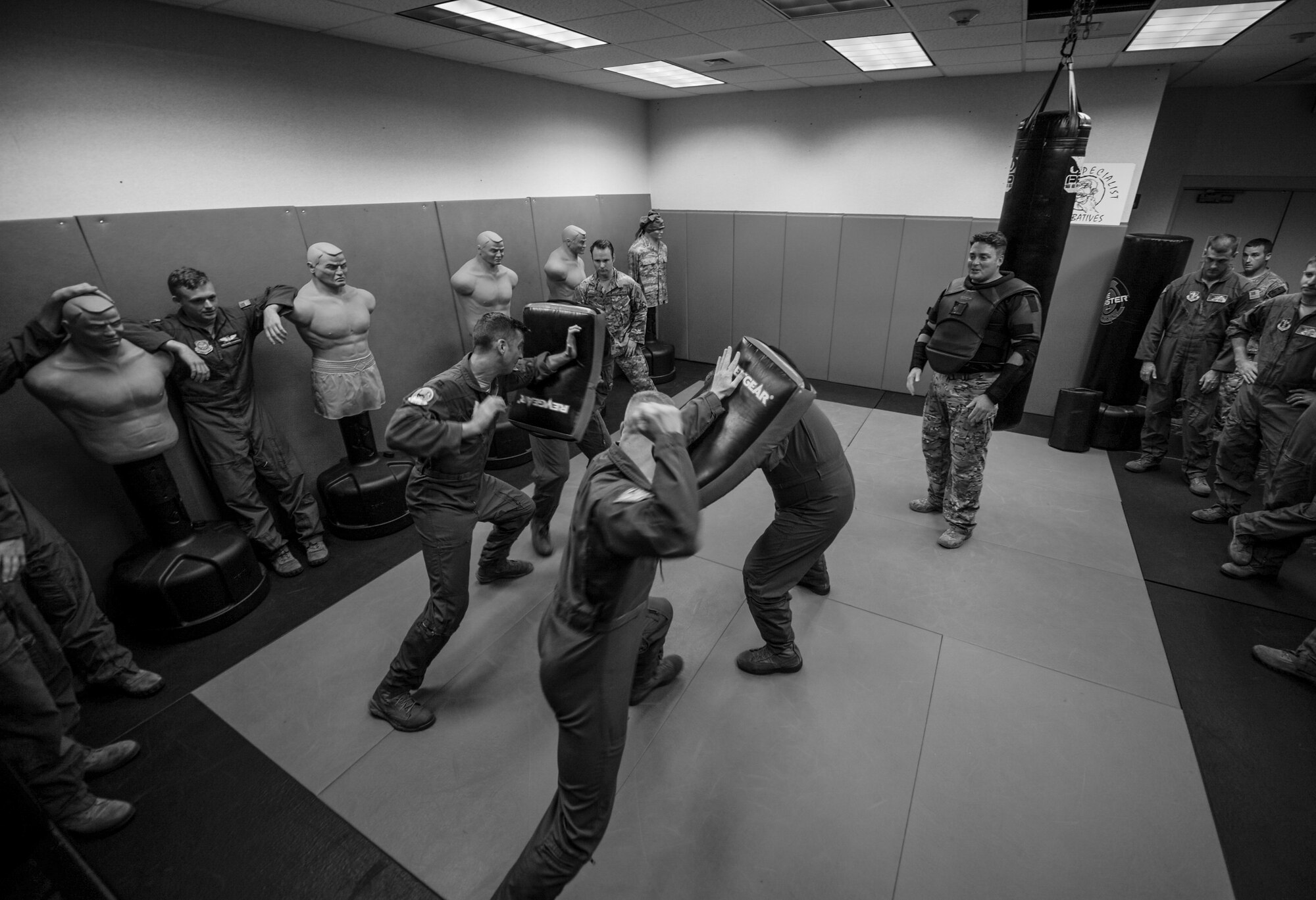 U.S. Air Force C-130J aircrew members practice combative techniques June 21, 2016, at Little Rock Air Force Base, Ark. C-130J pilots and loadmasters routinely undergo resistance and escape tactics in case they find themselves in hostile areas. (U.S. Air Force photo by Senior Airman Harry Brexel)