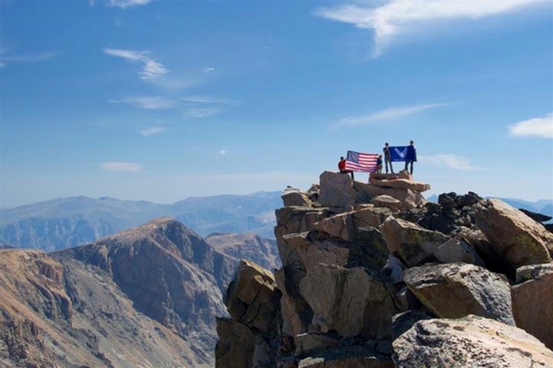 Airmen reach the summit of Granite Peak in Montana after a climb of more than 7,000 feet Aug. 30. They completed this task after three days as part of the U.S. Air Force 50 Summit Challenge, a group that was established in May, 2013. (Courtesy photo)