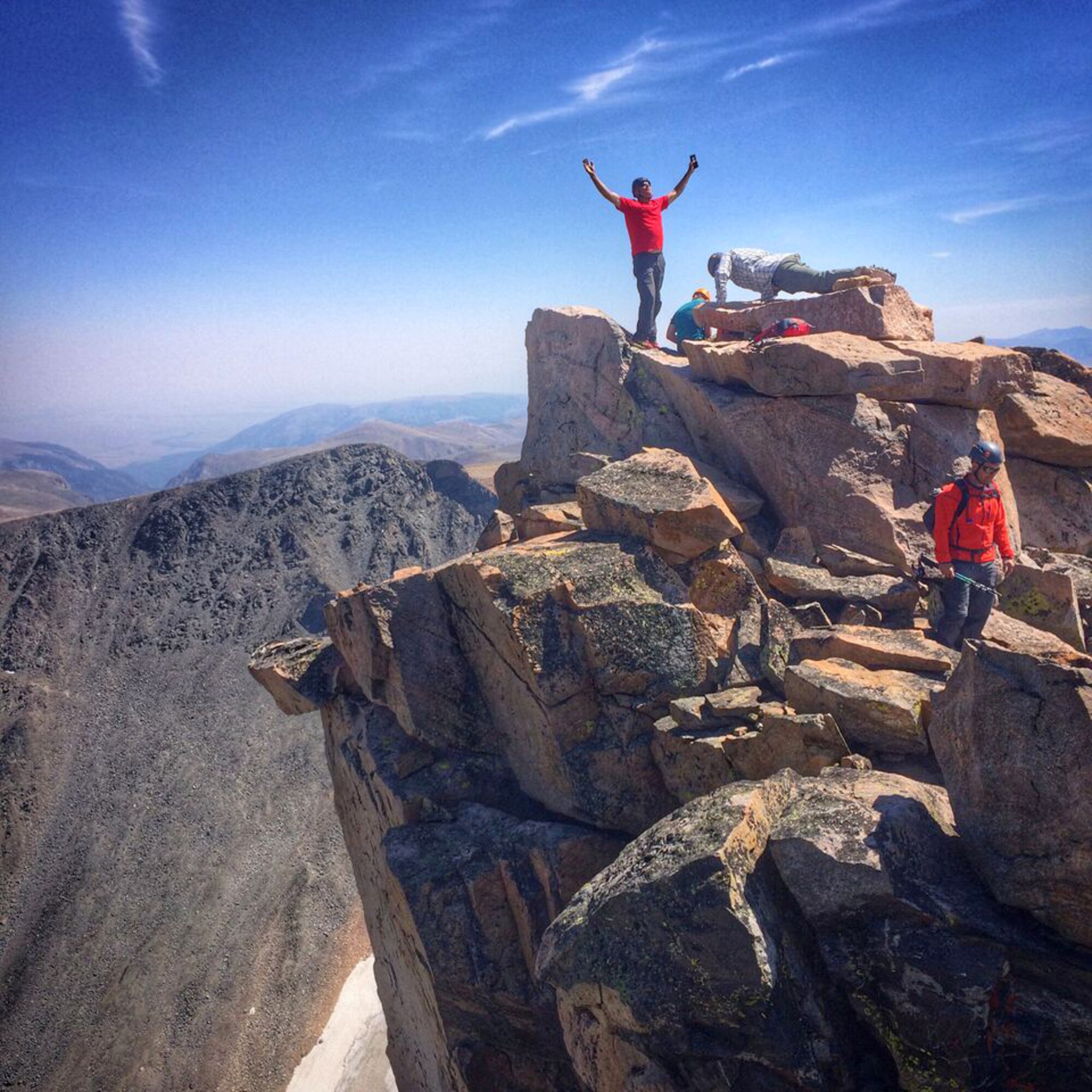 Individuals stand atop Granite Peak in Montana as they take part in the U.S. Air Force 50 Summit Challenge Aug. 30. The climb consisted of 28 miles in three days, gaining over 7,000 feet of elevation. The purpose of the challenge is to boost the mental, physical, social and spiritual health of our service members through climbs of each American state’s highest geographical point. (Courtesy photo)