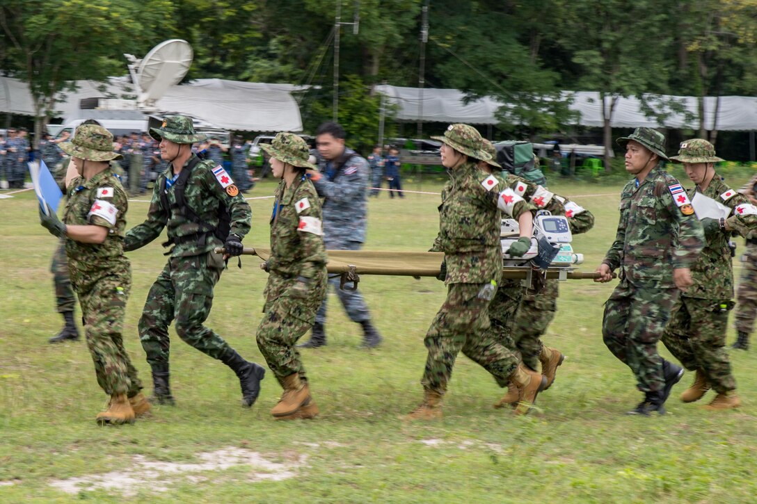 Multinational service members conduct a Search and Rescue demonstration during the opening ceremony for ASEAN Exercise 16-3 at 14th Military Circle Airfield, Chonburi Province, Thailand Sept. 5, 2016. AEX 16-3 is a small-scale humanitarian assistance and disaster relief exercise consisting of 18 nations and co-hosted by Thailand, Japan, Lao People’s Democratic Republic and the Russian Federation. It is the third iteration of the ASEAN Defense Ministers Meeting plus multinational exercise program in 2016.