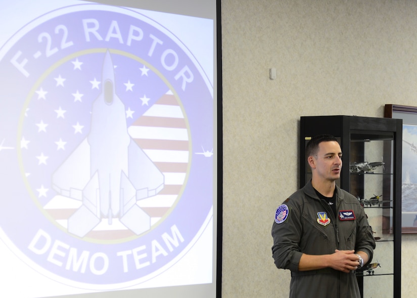 U.S. Air Force Maj. Dan, F-22 Raptor Demonstration Pilot, speaks to a group of students from Ypsilanti, Mich., at the Yankee Air Museum in Willow Run, Mich., Aug. 20, 2016. Dickinson spoke on the importance of education, discipline and passion as it relates to achieving one's personal goals.  (U.S. Air Force photo by 2nd Lt. Mahalia Frost)