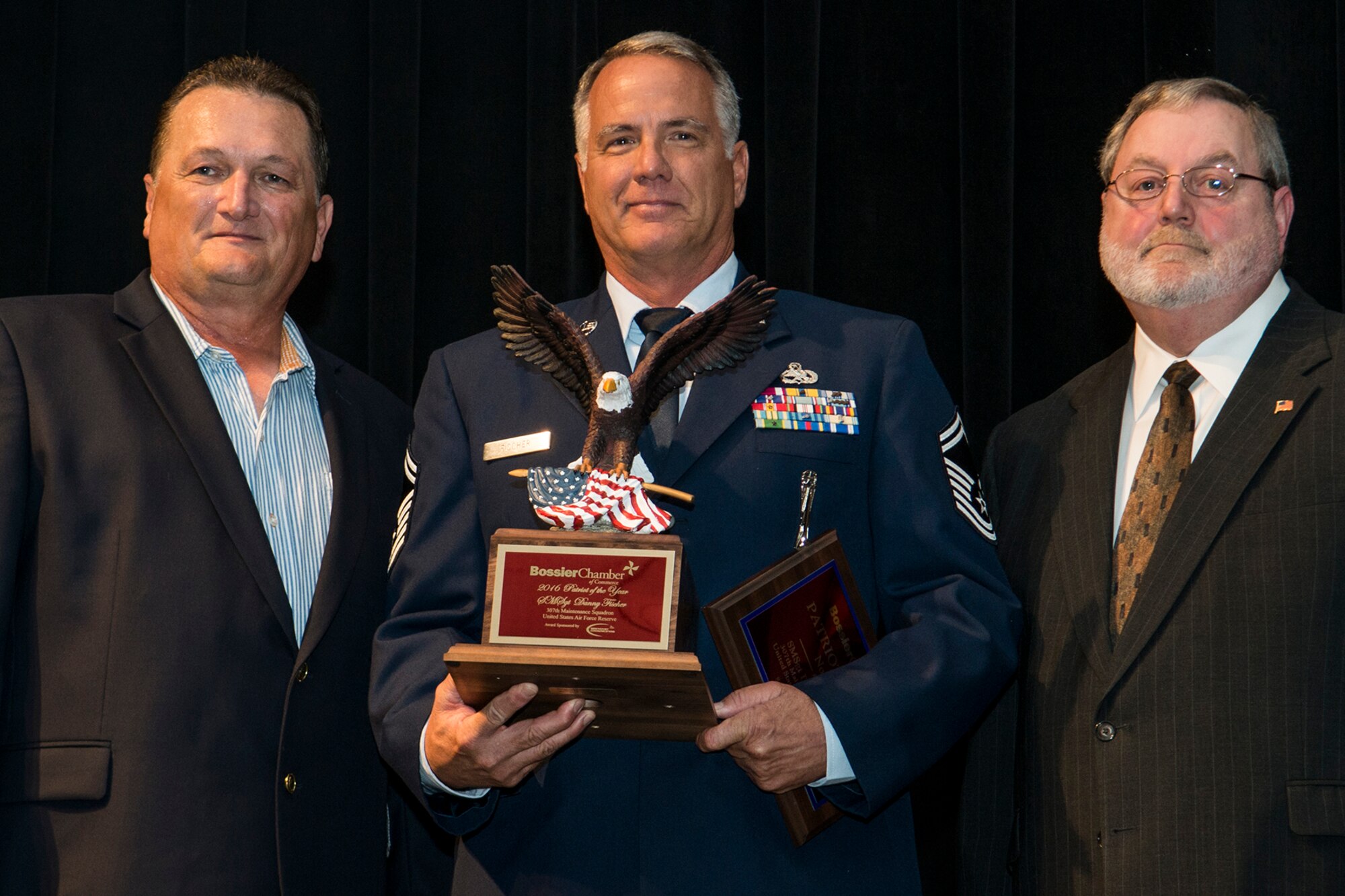 U.S. Air Force Reserve Senior Master Sgt. Danny Fischer receives the Patriot Award during a ceremony held on Sept. 7, 2016, Bossier City, La. Fischer is assigned to the 307th Maintenance Squadron and received the award during the annual Bossier Chamber of Commerce Patriot Awards ceremony, which recognizes outstanding performers who serve the Shreveport/Bossier City area in the fields of law enforcement, fire/EMS teams and the military. (U.S. Air Force photo by Master Sgt. Greg Steele/Released)