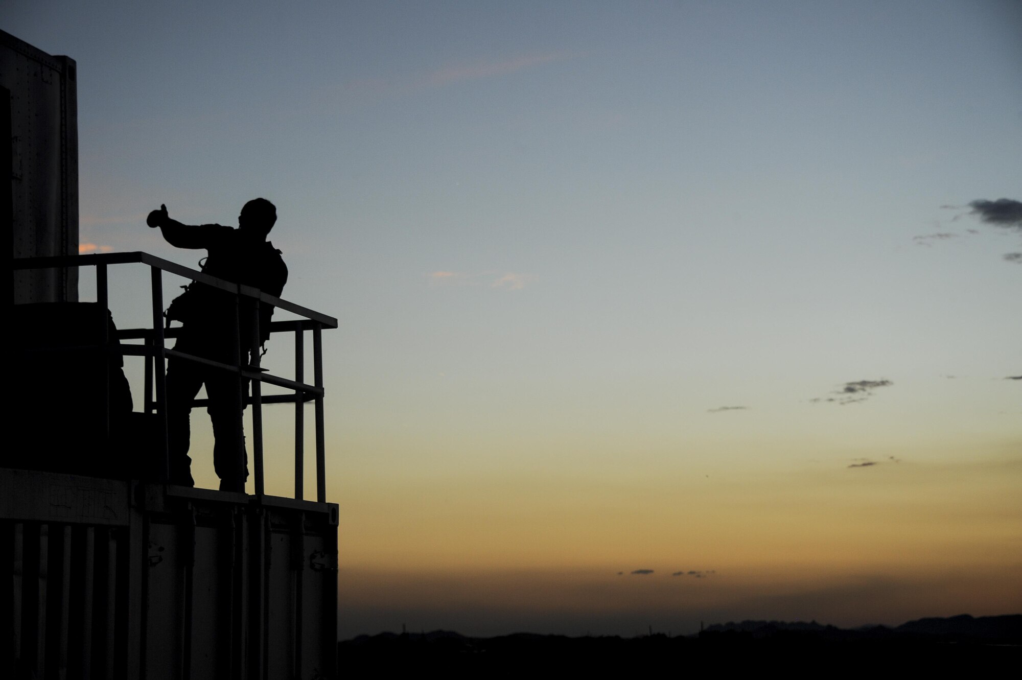 A Combat Leaders Course student gives a signal during training in Florence, Ariz., Aug. 31, 2016. The pararescuemen obtain their 7-level certification and become team leaders after the vigorous course. (U.S. Air Force photo by Airman 1st Class Mya M. Crosby)