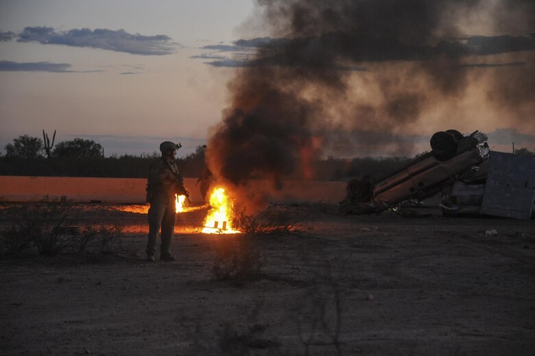 A Combat Leaders Course student stands guard during training in Florence, Ariz., Aug. 31, 2016. The 68th Rescue Flight crafted the 7-level certification training for pararescuemen across the U.S. Air Force.  (U.S. Air Force photo by Airman 1st Class Mya M. Crosby)