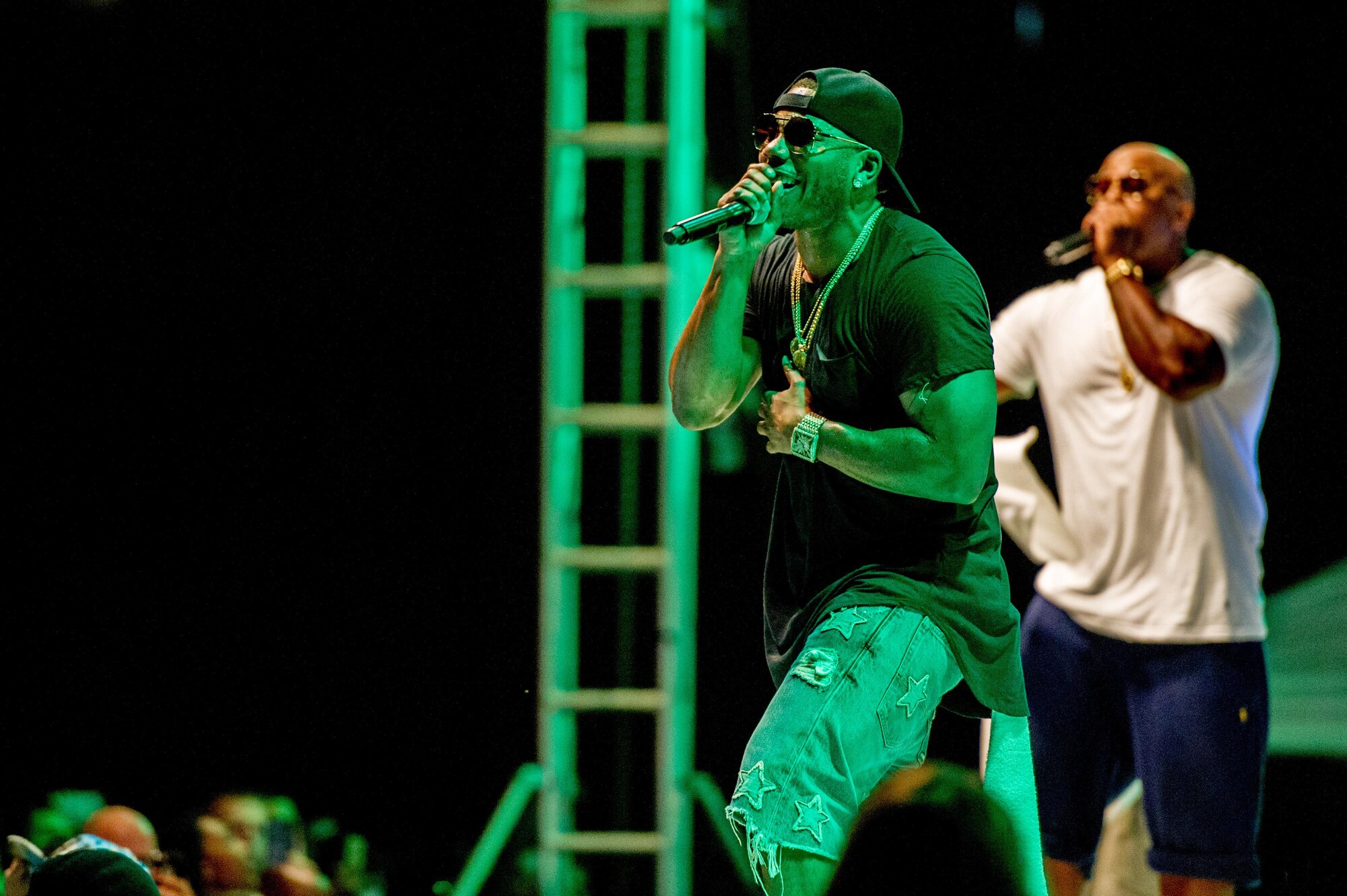 Nelly performs a song at Osan Air Base, Republic of Korea, Sept. 3, 2016. Nelly put on a one-night concert for members of Team Osan and their families. (U.S. Air Force photo by Staff Sgt. Jonathan Steffen)                                                                                           