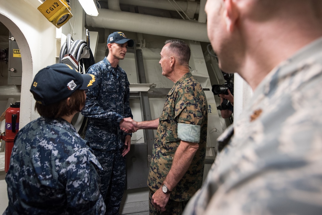 Marine Corps Gen. Joe Dunford, chairman of the Joint Chiefs of Staff, visits the crew aboard the Arleigh Burke-class guided missile destroyer USS Barry in Yokosuka, Japan, Sept. 7, 2016. DoD photo by Army Sgt. James K. McCann