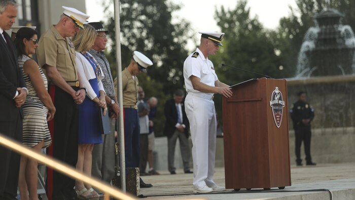 Navy Lt. Cdr. Bryan Davenport, center, the chaplain of Special Purpose Marine Air Ground Task Force - Nashville, leads a prayer during the opening ceremony of Marine Week Nashville in Nashville, Tenn., Sept. 7, 2016. More than 800 Marines are participating in Marine Week to give the citizens of the greater Nashville area the opportunity to meet the individual Marines and celebrate community, country and Corps.