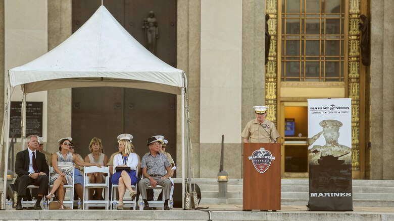 Lt. Gen. James B. Laster, right, the director of Marine Corps staff, offers remarks during the opening ceremony of Marine Week Nashville, Sept. 7, 2016. Marine Week celebrates the contributions of local Marines whose service to our nation has protected and preserved our way of life for hundreds of years.