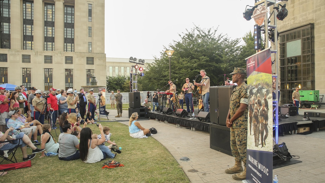 Darryl Worley, center-right, performs with the San Diego Marine Rock Band during the opening ceremony of Marine Week Nashville in Nashville, Tenn., Sept. 7, 2016. Marine Week is an opportunity for the people of the greater Nashville area to connect with Marines and learn about Corps’ history and capabilities.