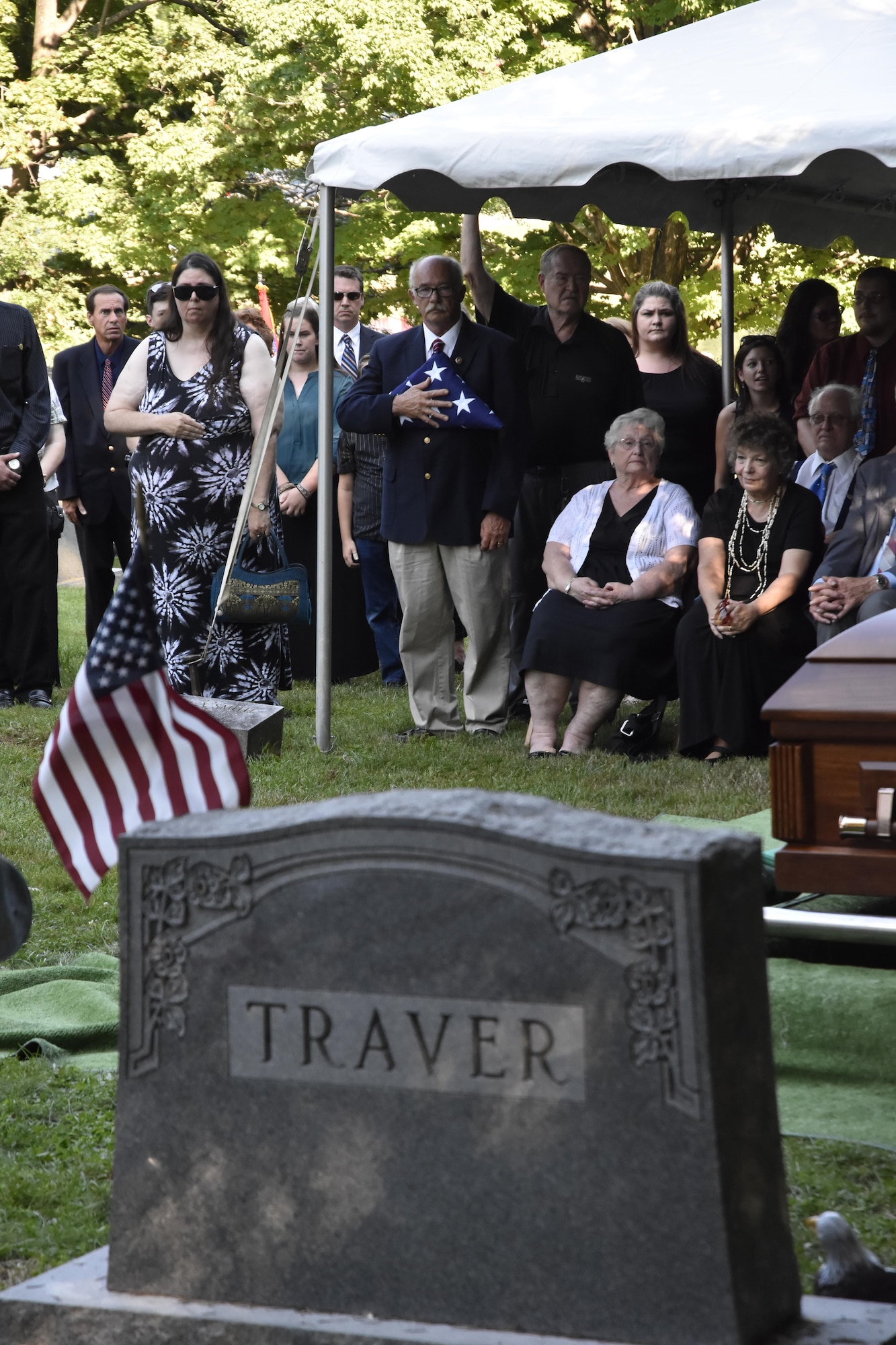 Pfc. George H. Traver was killed in action on Nov. 20, 1943. His body was one of many found earlier this year in the Gilbert Islands, just off the coast of Hawaii. The Marine Air Support Squadron 6 from Westover ARB, Mass. presided over the formal military funeral ceremony and presented his nephew, David Silliman, with a United States flag in his honor. (U.S. Air Force photo/ TSgt. Amelia Leonard)