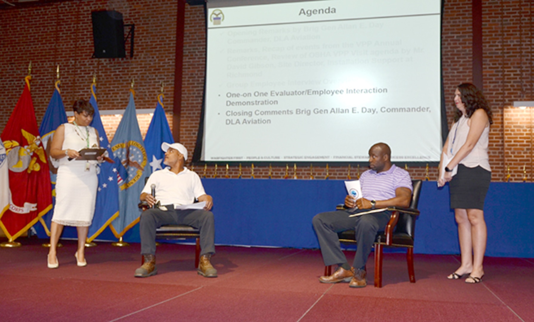 Safety Team members from Defense Logistics Agency Installation Support at Richmond, Virginia, perform an interview skit Sept. 6, 2016 during a Safety Town Hall in the Lotts Conference Center to show Defense Supply Center Richmond employees what to expect in upcoming on-the-spot interviews next week by the Occupational Safety and Health Administration’s Voluntary Protection Programs evaluation team. 