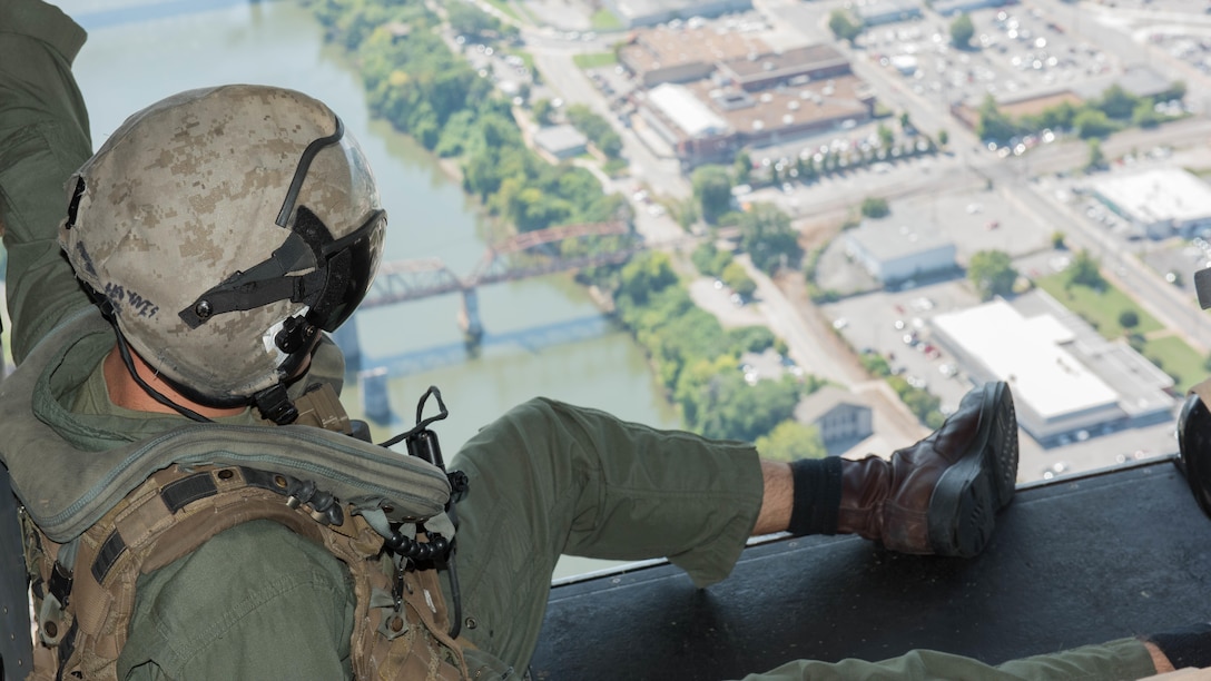 Cpl. Joshua Haynes a crewmember with Marine Medium Tiltrotor Squadron 261 supervises the passengers during the MV-22B Osprey flights over Nashville, Tenn., Sept. 7, 2016 as part of Marine Week.  Marine Week provides an opportunity for the Marine Corps to visit cities that normally don’t have the opportunity to interact with Marines on a regular basis.