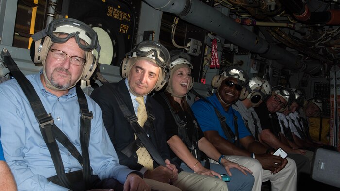 Local dignitaries from Nashville, Tenn., enjoy their military experience with the crew of Marine Medium Tiltrotor Squadron 261 during the MV-22B Osprey flights over Nashville as part of Marine Week. Marine Week Nashville is an opportunity to showcase the Marines and help people understand the capabilities of the Marine Corps.