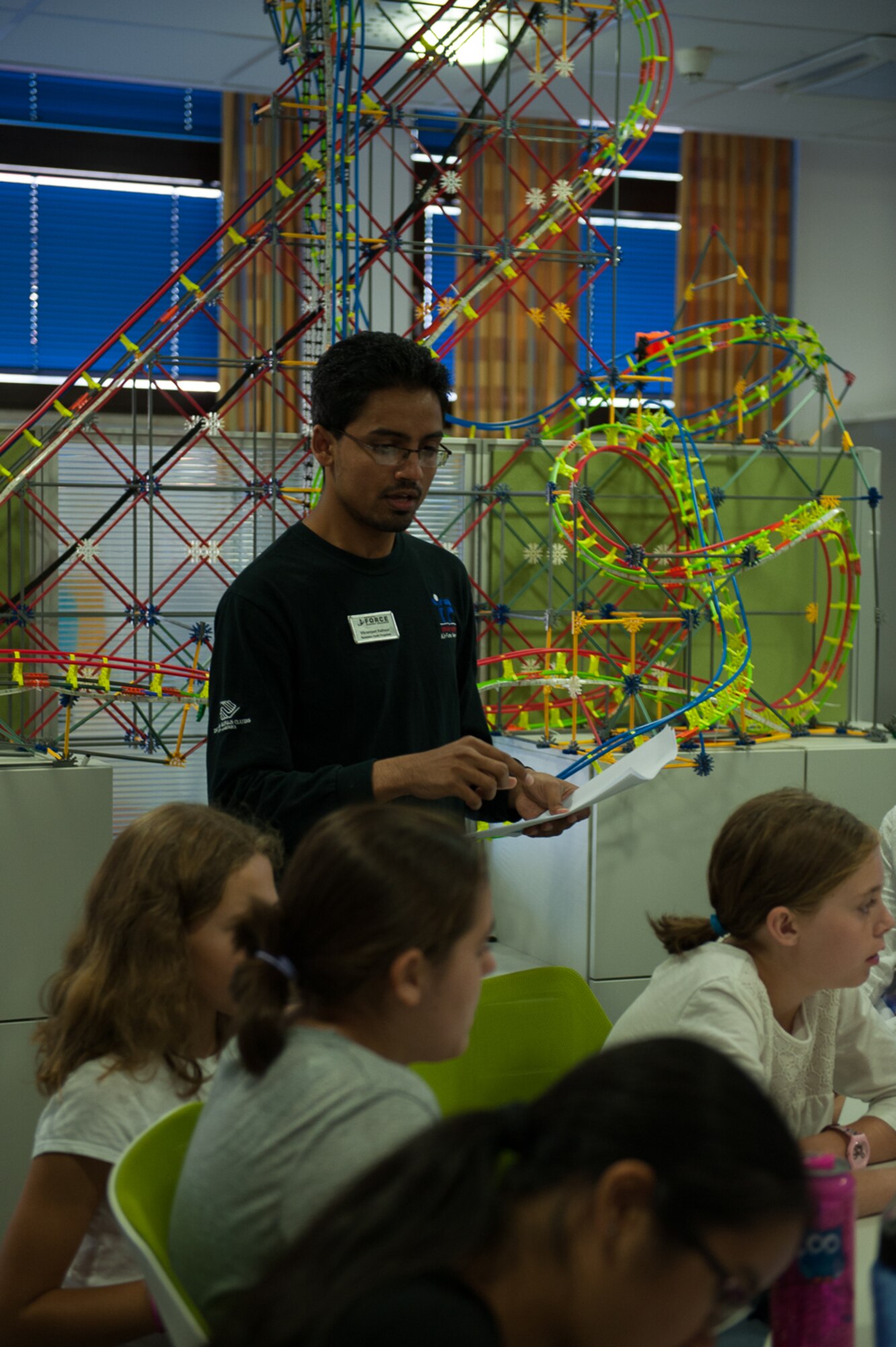 Vikramjeet Rathaur, Ramstein Youth Center programs STEM Coordinator, explains an assignment during a DIY Girls class Sept. 6, 2016, at Ramstein Air Base, Germany. The Ramstein Youth Center offers other, more specific programs on other days of the week that concentrate more in music making, robotics, 3-D printing, woodworking, and drones . All participants are welcome to join those classes as well. (U.S. Air Force photo/Airman 1st Class Savannah L. Waters)