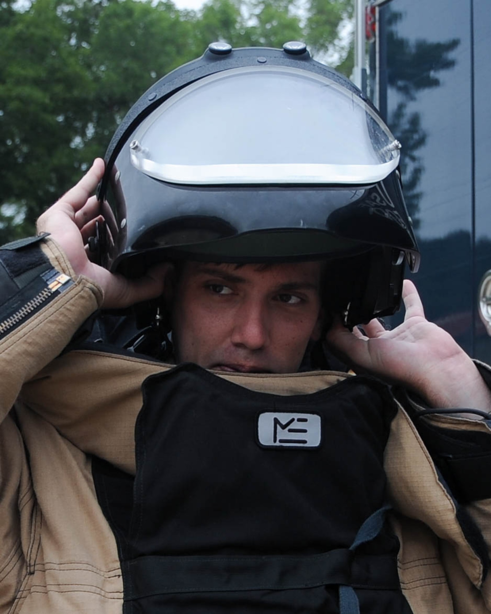 Senior Airman Brayden Kerr, 2nd Civil Engineer Squadron Explosive Ordnance Disposal Flight team member, uses the operating control unit to pilot the F6A robot at Barksdale Air Force Base, La., Sept. 6, 2016. The OCU controls the robot’s movements and camera, allowing the technicians to safely eliminate threats from a distance. (U.S. Air Force photo/Airman 1st Class Stuart Bright)