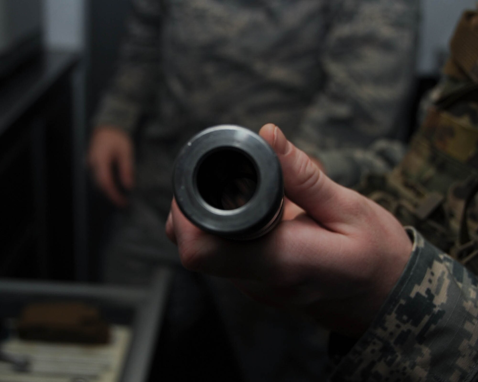 Senior Airman Brayden Kerr, 2nd Civil Engineer Squadron Explosive Ordnance Disposal Flight team member, uses the operating control unit to pilot the F6A robot at Barksdale Air Force Base, La., Sept. 6, 2016. The OCU controls the robot’s movements and camera, allowing the technicians to safely eliminate threats from a distance. (U.S. Air Force photo/Airman 1st Class Stuart Bright)
