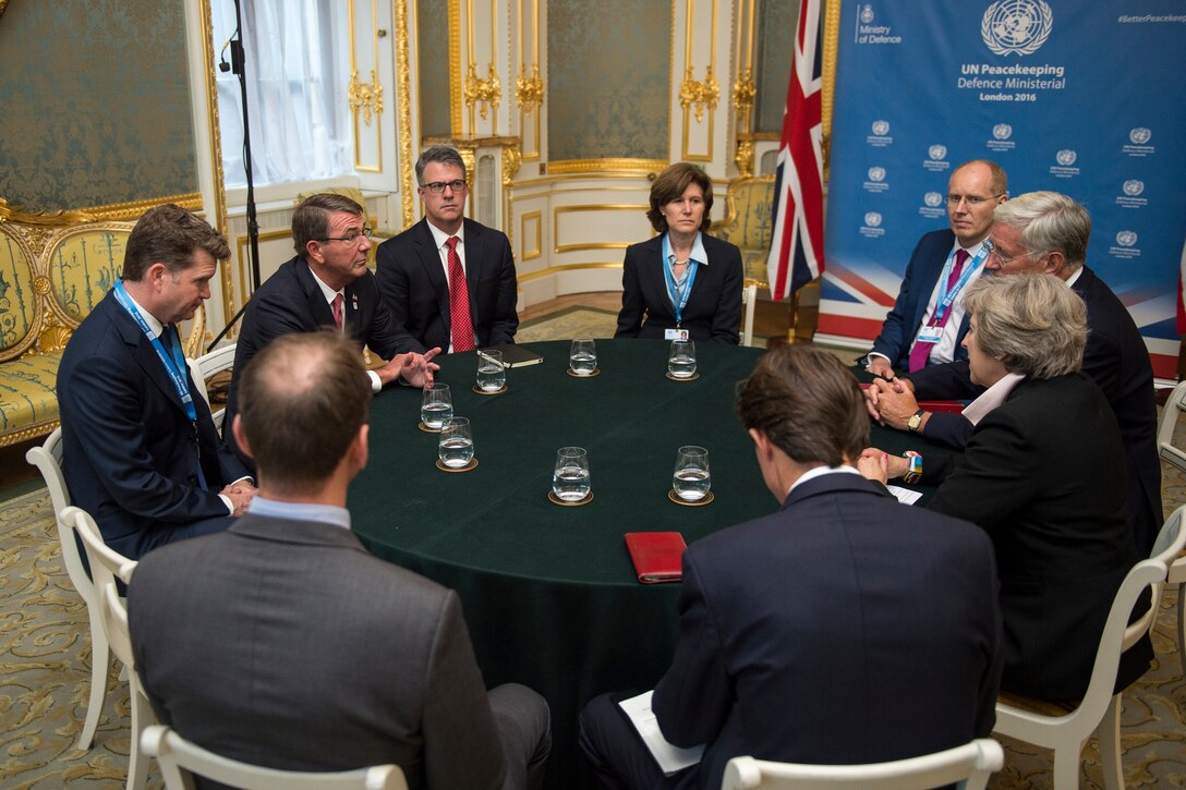 Defense Secretary Ash Carter speaks with the Prime Minister of the United Kingdom Theresa May before an official dinner at Lancaster House in London, England, Sept. 7, 2016. DoD photo by Air Force Tech. Sgt. Brigitte N. Brantley