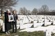 Terry Harmon and Erin Miller, daughter and granddaughter of 2nd Lt. Elaine Harmon, Women Airforce Service Pilot, hold a portrait of her in Arlington National Cemetery, Va. Jan. 31, 2016. Harmon is the first WASP to be buried in Arlington since the passing of HR-4336, a bill introduced by Rep. Martha McSally, to ensure WASPs are eligible for interment at Arlington National Cemetery. (U.S. Air Force photo/Staff Sgt. Katherine Tereyama)