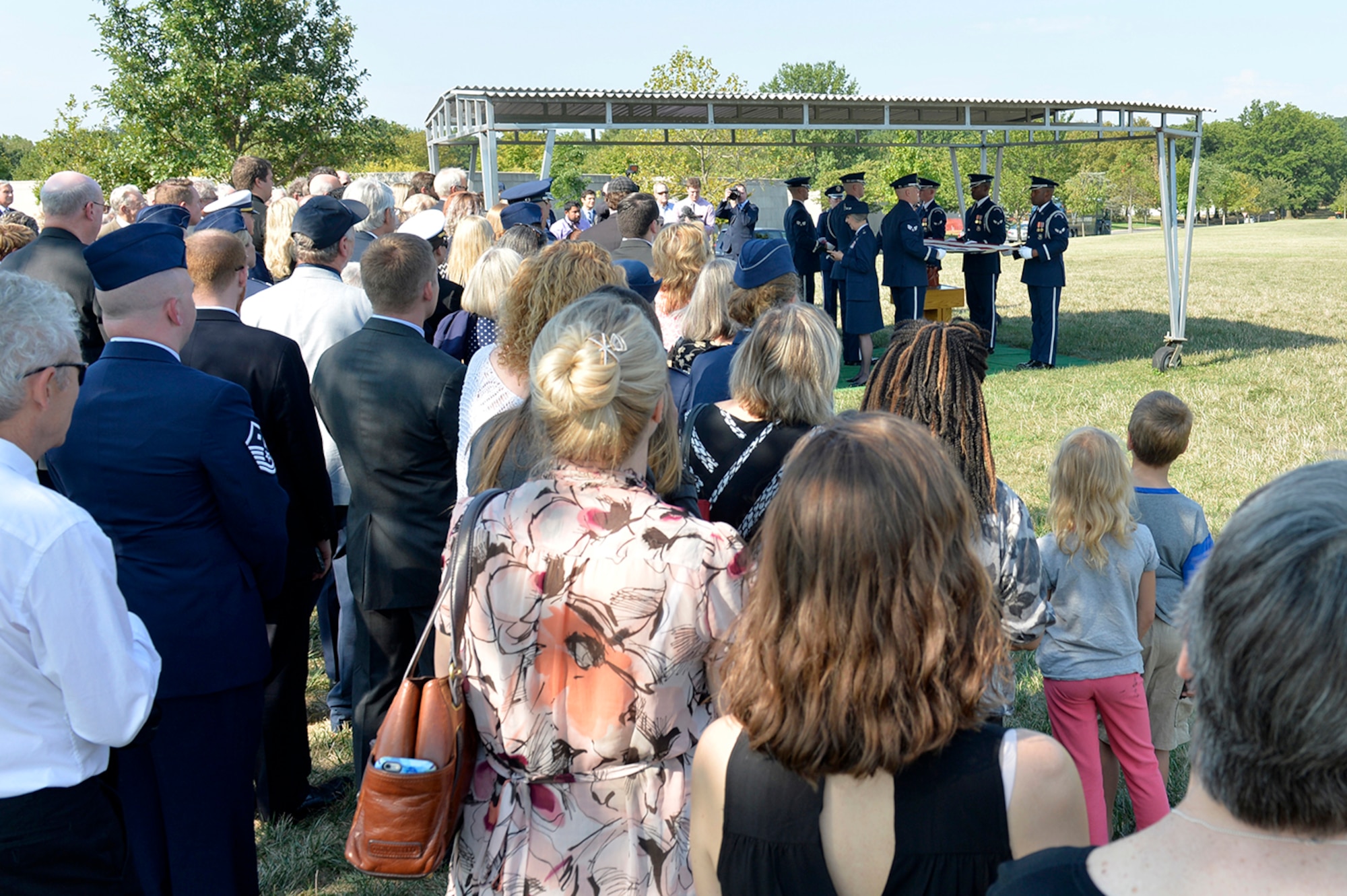 Family and friends pay their respects as 2nd Lt. Elaine Harmon, one of the original Women Airforce Service Pilots, is laid to rest at Arlington National Cemetery, Va., Sept. 7, 2016. Harmon died April 21, 2015, at the age of 95. (U.S. Air Force photo/Staff Sgt. Whitney Stanfield) 