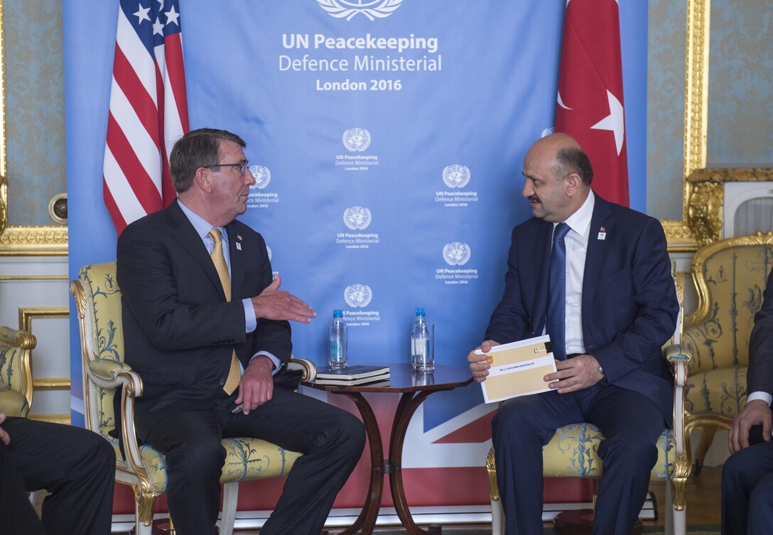 Defense Secretary Ash Carter meets with Turkish Defense Minister Fikri Işik during a U.N. Peacekeeping Ministerial meeting at Lancaster House in London, England, Sept. 8, 2016. DoD photo by Air Force Tech. Sgt. Brigitte N. Brantley