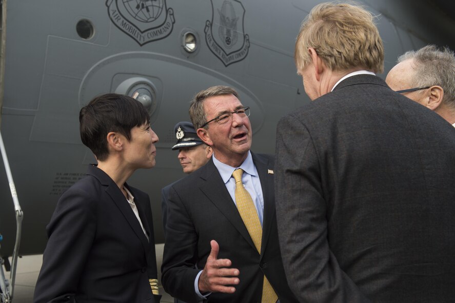 Defense Secretary Ash Carter, center, and Norwegian Defense Minister Ine Eriksen Soreide greet Samuel Heins, right, U.S. ambassador to Norway.