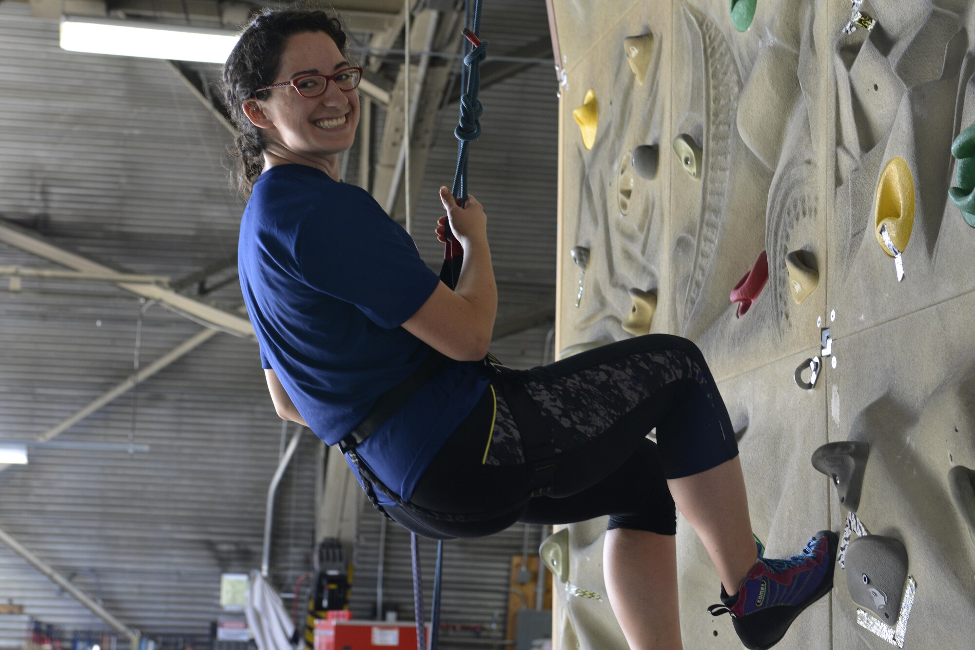 Hannah Foreman lowers down a rock wall during an introduction to climbing and belay class at the Joint Base Elmendorf-Richardson Outdoor Recreation Center, Sept. 1, 2016. The class was open to all women with base access as part of the Women in the Wilderness program.