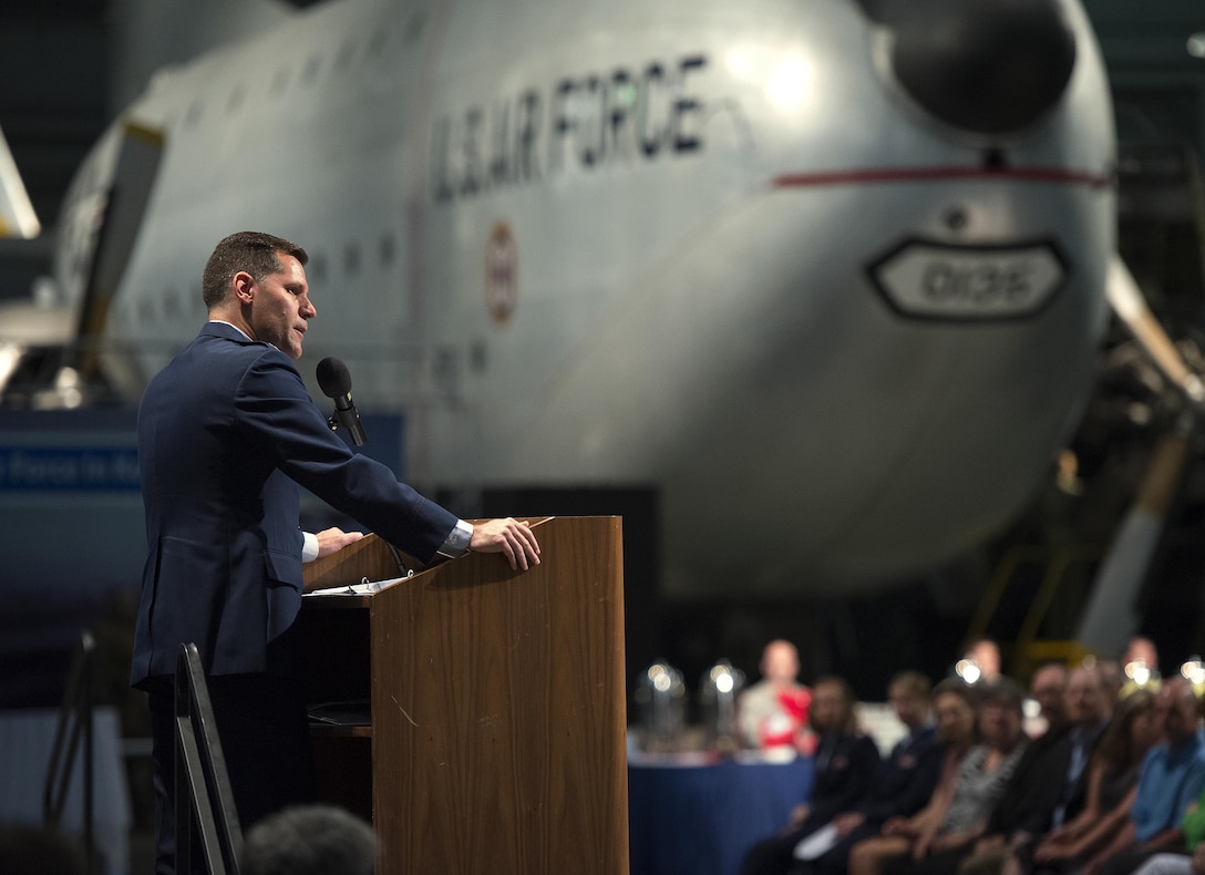 Col. John Devillier speaks at the 88th Air Base Wing change of command ceremony at the National Museum of the U.S. Air Force at Wright-Patterson Air Force Base, Ohio, June 21, 2016, marking the end of his tenure as the 88th ABW commander. Devillier relinquished command to Col. Bradley W. McDonald and is designated to become special assistant to the director of the Joint Chiefs of Staff for general officer matters at the Pentagon. (U.S. Air Force photo / R.J. Oriez)