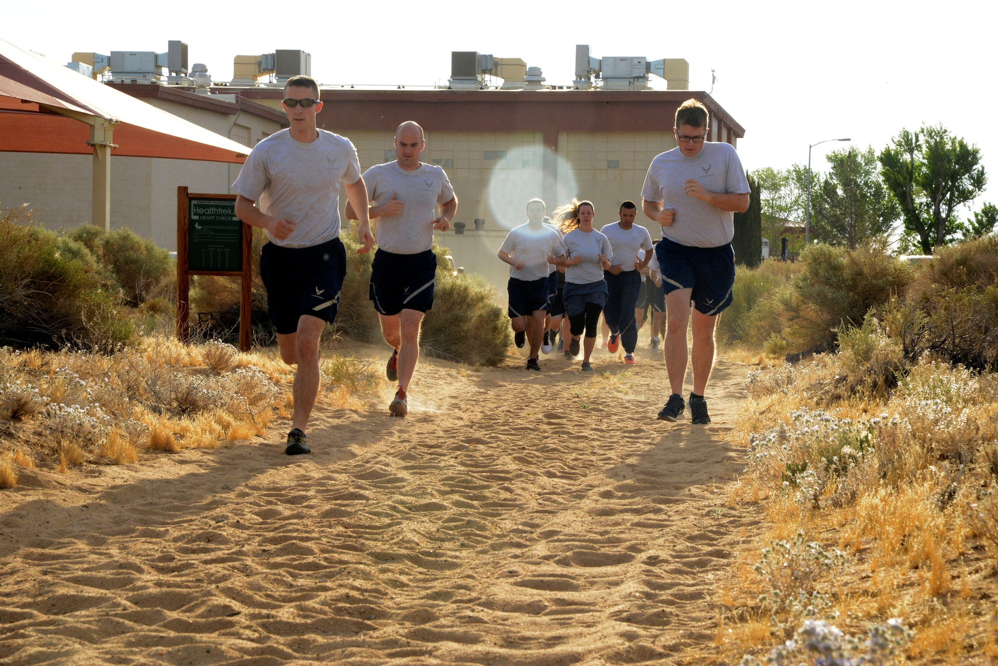 Airmen get a running start during a fitness dash at the Rosburg Fitness Center in June . (U.S. Air Force photo by Christopher Ball)
