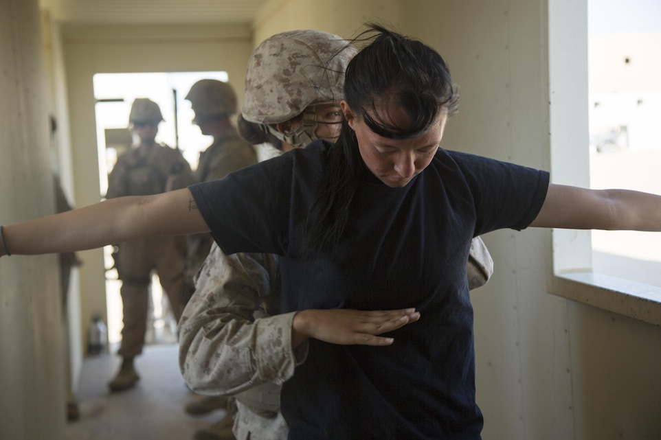 Marines with Special Purpose Marine Air Ground Task Force, Crisis Response, Central Command, conduct a non-combatant evacuation operation exercise at Range 220, a military operations on urbanized terrain facility, aboard the Marine Corps Air Ground Combat Center, Twentynine Palms, Calif., Aug. 24, as part of a Certification Exercise. (Official Marine Corps photo by Lance Cpl. Levi Schultz/Released)