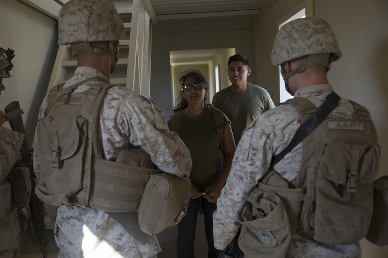 Marines with Special Purpose Marine Air Ground Task Force, Crisis Response, Central Command, conduct a non-combatant evacuation operation exercise at Range 220, a military operations on urbanized terrain facility, aboard the Marine Corps Air Ground Combat Center, Twentynine Palms, Calif., Aug. 24, as part of a Certification Exercise. (Official Marine Corps photo by Lance Cpl. Levi Schultz/Released)