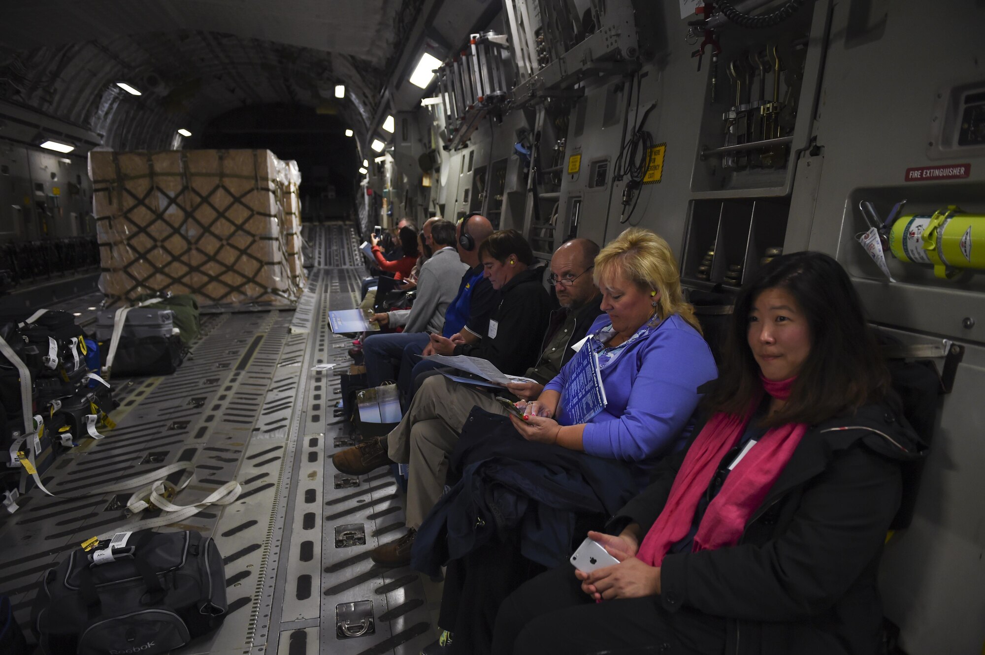 McChord civic leaders sit on board a C-17 Globemaster III before departing to Joint Base Elmendorf-Richardson, Alaska, Aug. 30, 2016. The group received a two-day tour of the base and various units to familiarize itself with the missions and Airmen and Soldiers there. (U.S. Air Force photo/ Staff Sgt. Naomi Shipley)