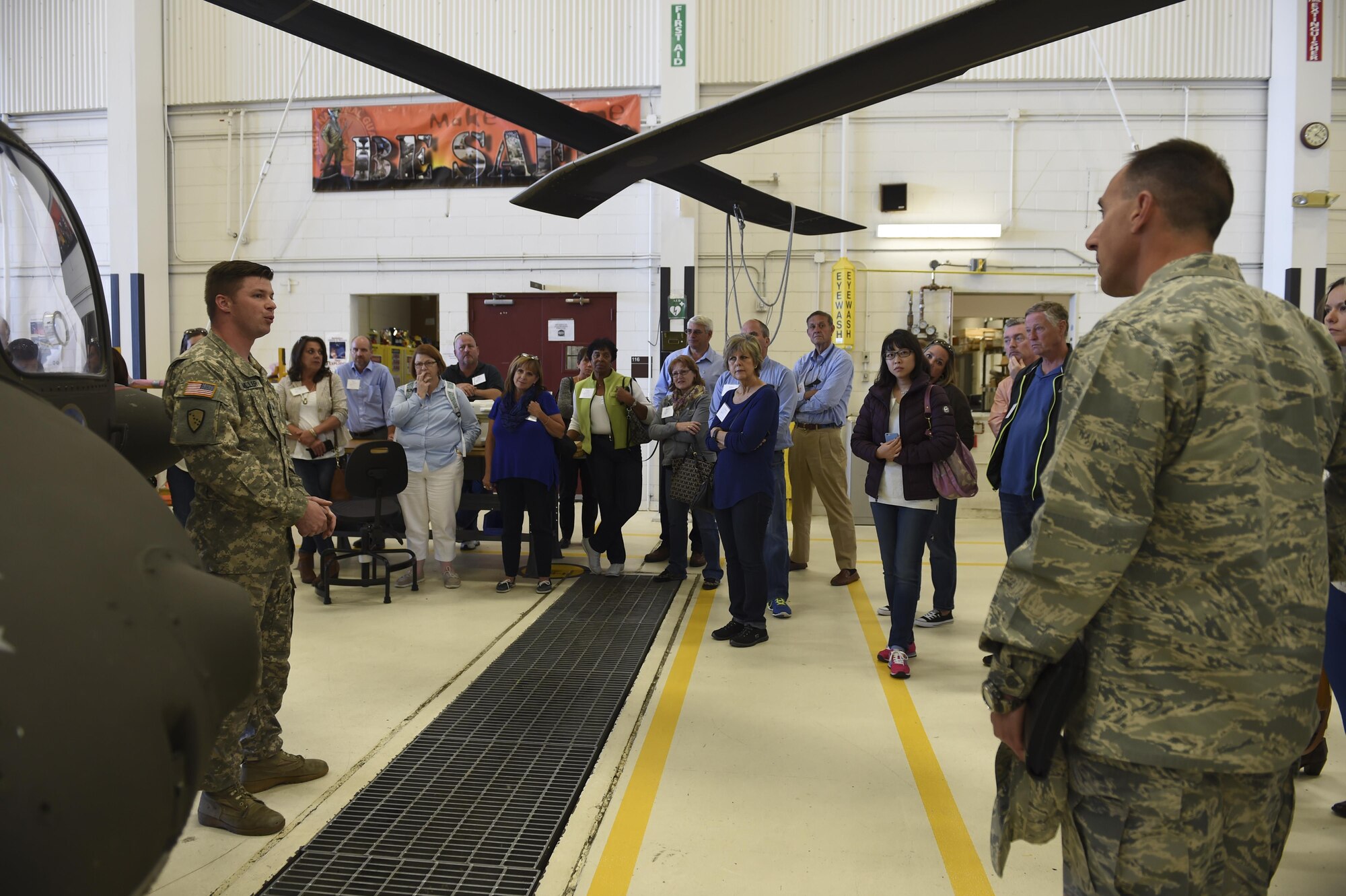 McChord civic leaders receive a brief about the Black Hawk at Joint Base Elmendorf-Richardson, Alaska, Aug. 31, 2016. The group was able to tour the helicopter, as well as hear from those who maintain it. (U.S. Air Force photo/ Staff Sgt. Naomi Shipley)