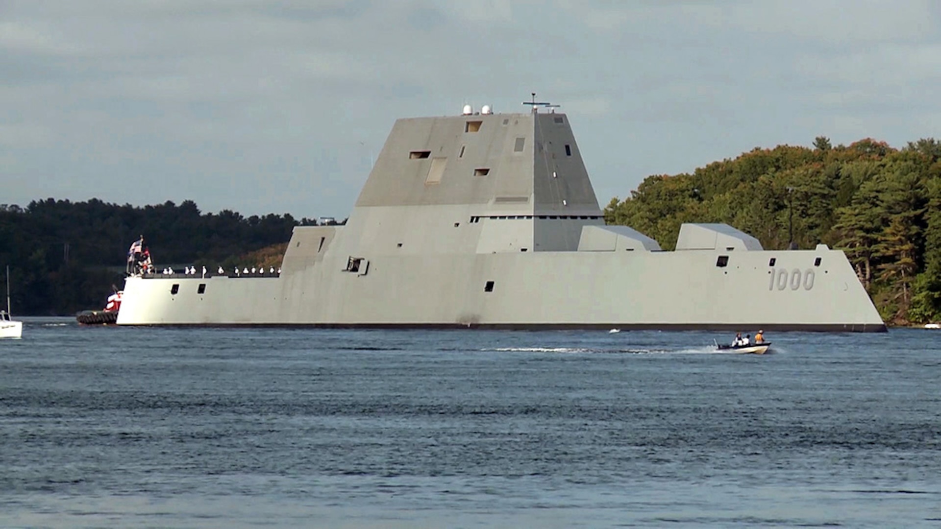 Video frame grab showing the future USS Zumwalt (DDG 1000) departing Bath Iron Works marking the beginning of a 3-month journey to its new homeport in San Diego, Sept. 7, 2016. Crewed by 147 Sailors, Zumwalt is the lead ship of a class of next-generation multi-mission destroyers designed to strengthen naval power. They are capable of performing critical maritime missions and enhance the Navy's ability to provide deterrence, power projection and sea control. 