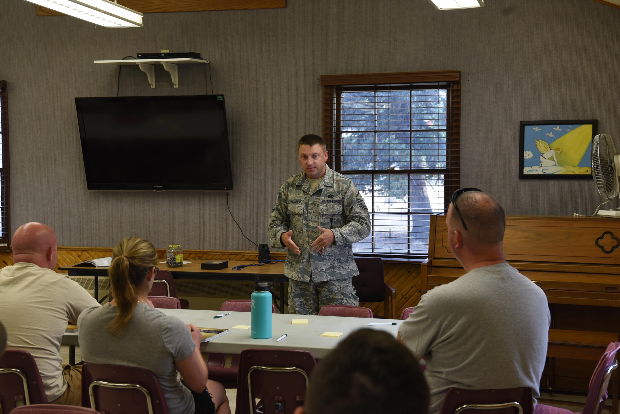 Master Sgt. Brandon Finefrock, 90th Missile Security Forces Squadron first sergeant, gives an introduction for the Financial Peace University course on F.E. Warren Air Force Base, Wyo., Sept. 7, 2016. This was the first day of classes for the free course, which is conducted by the chapel. (U.S. Air Force photo by Airman 1st Class Breanna Carter) 