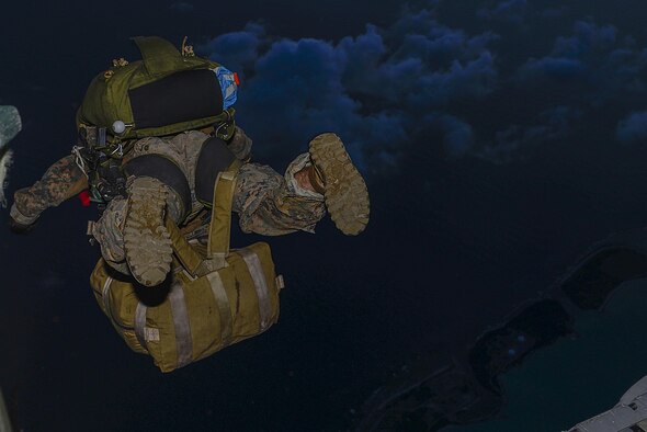 A Marine jumps from an MC-130J Commando II during an airfield seizure exercise at Wake Island Aug. 24, 2016. (U.S. Air Force photo/Senior Airmen Stephen G. Eigel)

