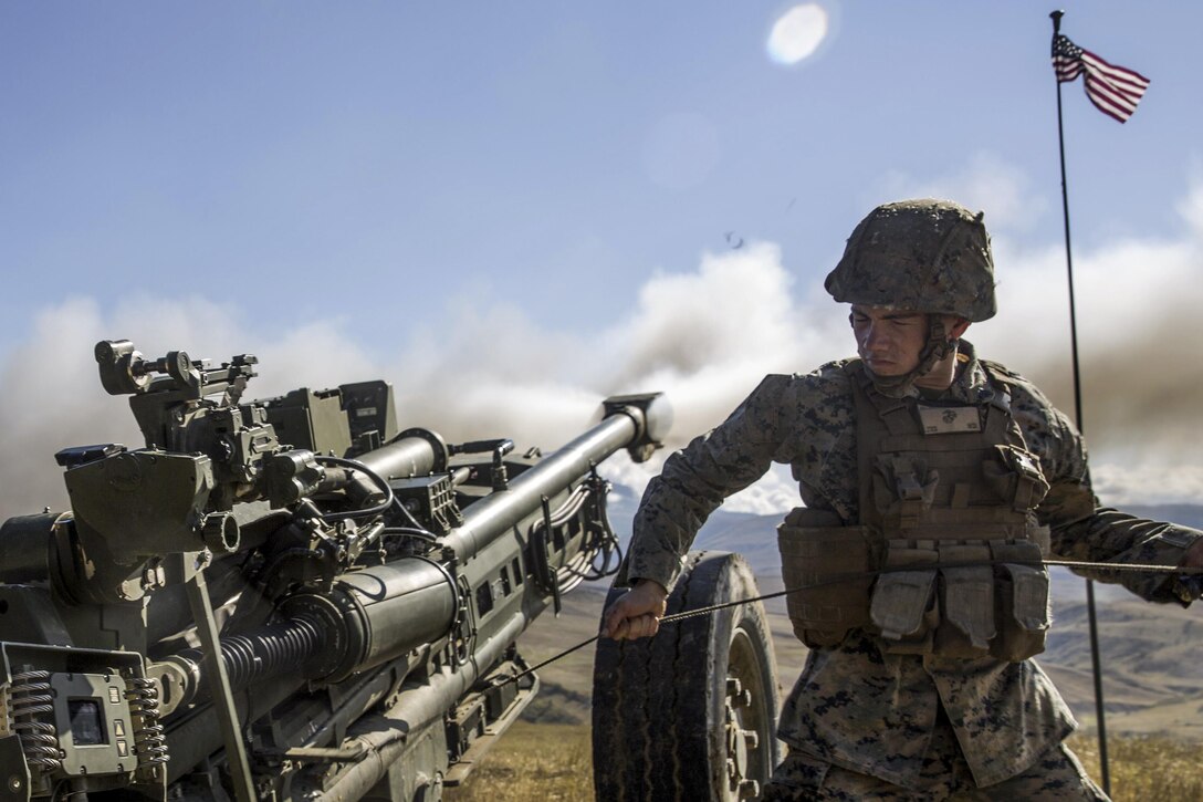 A Marine fires artillery rounds during Agile Spirit 16 at Orpholo Training Area, Georgia, Sept. 5, 2016. Partner nations train together and strengthen their alliance through several combined arms ranges throughout the exercise. Marine Corps photo by Sgt. Michelle Reif