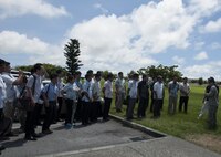 Lt. Col. Sarah Babbitt, 18th Security Forces Squadron commander, speaks to local police officers Sept. 2, 2016, at Kadena Air Base, Japan. More than 50 police officers from the local community were invited onto Kadena to tour the base and security forces’ facilities. (U.S. Air Force photo by Senior Airman Lynette M. Rolen)