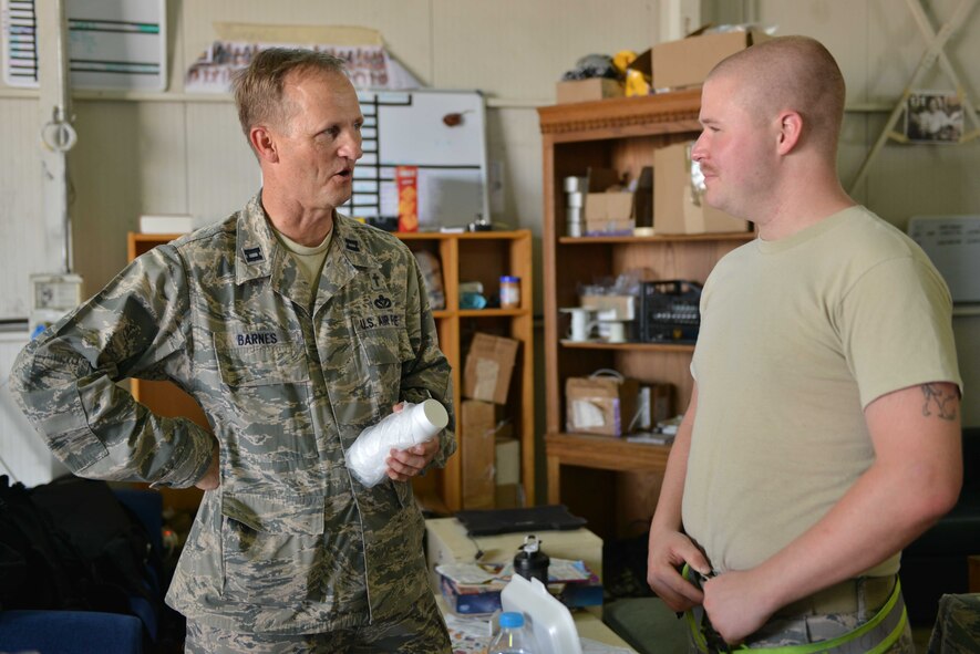 U.S. Air Force Capt. Martin Barnes, 39th Air Base Wing chaplain, speaks with an Airman during a visit Sept. 2, 2016, at Incirlik Air Base, Turkey. Chaplains are responsible for managing and supporting spiritual centers on military installations, conducting worship services, and advising leadership spiritual, religious, ethical, moral, morale and quality-of-life issues. (U.S. Air Force photo by Senior Airman John Nieves Camacho)