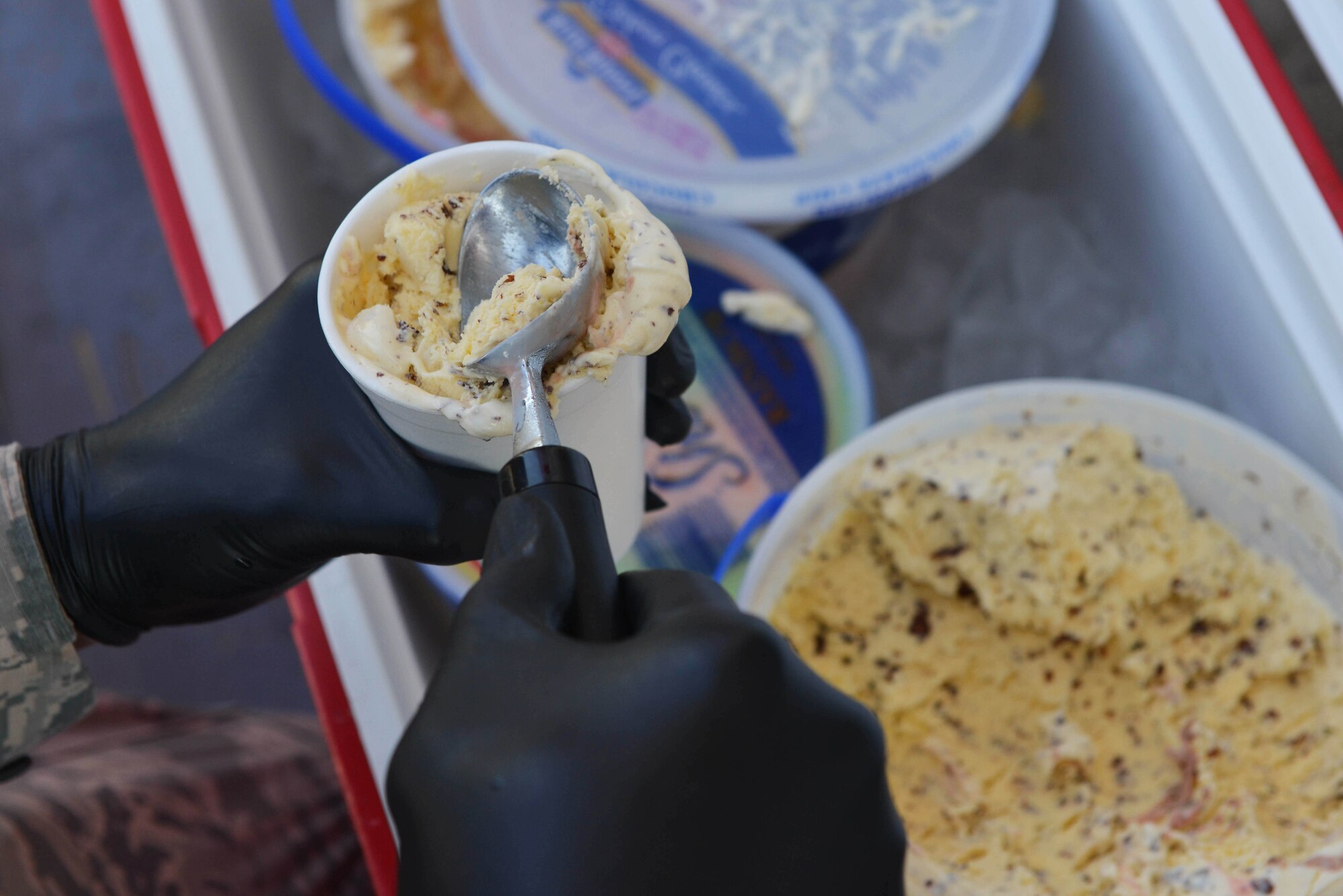 U.S. Airmen from the 39th Air Base Wing chapel team served ice cream to Airmen on the flight line Sept. 2, 2016, at Incirlik Air Base, Turkey. The team brought ice cream to Airmen as a way to boost morale and check on quality of life. (U.S. Air Force photo by Senior Airman John Nieves Camacho)