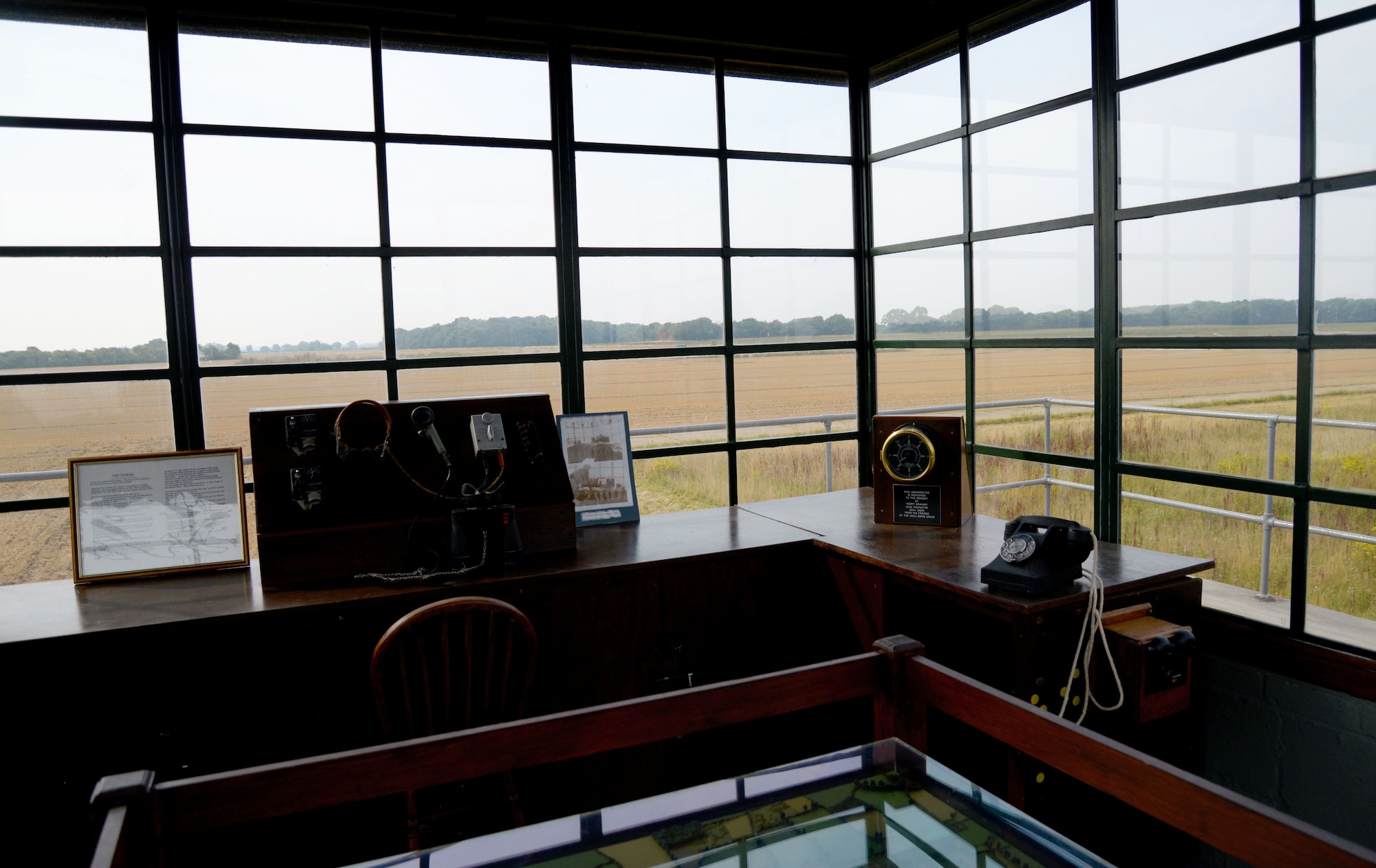 The remains of the taxiway can be seen from the top of the air traffic control tower at the 100th Bomb Group Memorial in Thorpe Abbotts, England. The tower was reconstructed to honor the squadrons and units which served from that airfield between 1943 to 1945. During World War II, the 100th BG suffered significant loss during the initial bombing missions, which earned them the nickname, the “Bloody Hundredth.” A group of volunteers, who continue to maintain the museum today, began the preservation of the site in the 1970s. (U.S. Air Force photo by Senior Airman Justine Rho)