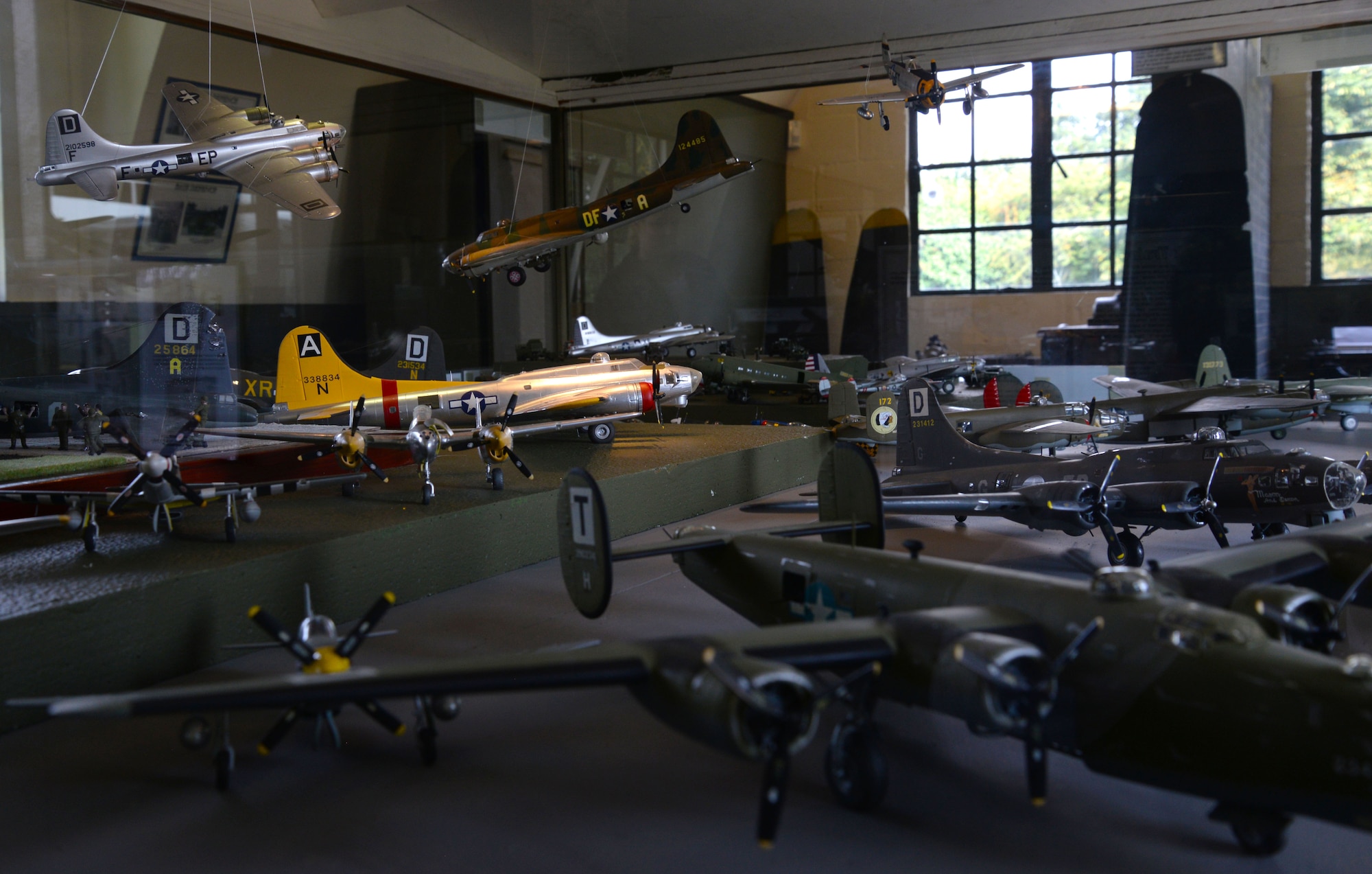 Model aircraft are displayed as part of the collection of artifacts at the Thorpe Abbotts museum Aug. 25, 2016, in East Anglia, England. The museum consists of the reconstructed air traffic control tower and two hangars. The museum is maintained by local volunteers and is donation based. (U.S. Air Force photo by Senior Airman Justine Rho)