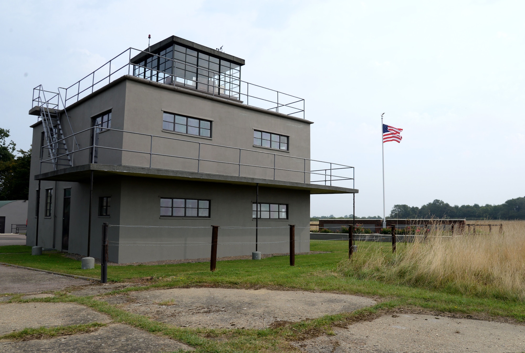 The air traffic control tower at the 100th Bomb Group Memorial in Thorpe Abbotts, England, was reconstructed to honor the squadrons and units which served from that airfield between 1943 to 1945. During World War II, the 100th BG suffered tremendous loss during the initial bombing missions, which earned them the nickname, the “Bloody Hundredth.” A group of volunteers, who continue to maintain the museum today, began the preservation of the site in the 1970s. (U.S. Air Force photo by Senior Airman Justine Rho)