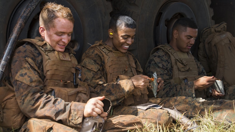 Marines from Bravo Company, “Black Sheep,” 1st Battalion, 12th Marine Regiment, eat chow during an intermission during a training exercise  at Marine Corps Base Hawaii, Sept. 06, 2016.  Marines from Bravo Co., “Black Sheep,” 1st Bn., 12th Marines, participated in exercise Spartan Fury 16.4. Spartan Fury is a pre-deployment exercise in which service members conduct live-fire artillery training and unit leaders are able to further assess and improve the lethality of the battalion.