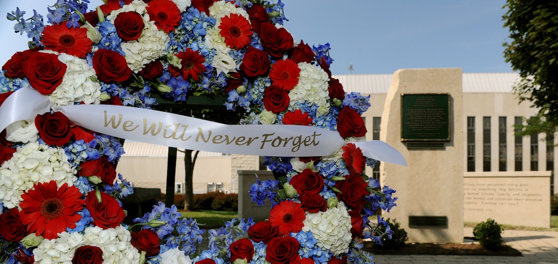 A wreath sits at the Naval War College's Patriots Memorial in Newport, R.I., before a remembrance ceremony to commemorate the 12th anniversary of the 9/11 attacks, Sept. 11, 2013. The ceremony served as an opportunity to honor the 11 fallen Naval War College students and alumni killed on Sept. 11, 2001. Navy photo by Chief Petty Officer James E. Foehl