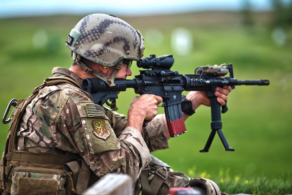 A defender from the 91st Security Forces Group fires his M4 at the U.S. Army range at Camp Grafton Training Center, N.D., Sept. 7, 2016. Defenders utilized the range to practice engaging targets from 50 to 300 m. (U.S. Air Force photo/Airman 1st Class J.T. Armstrong)