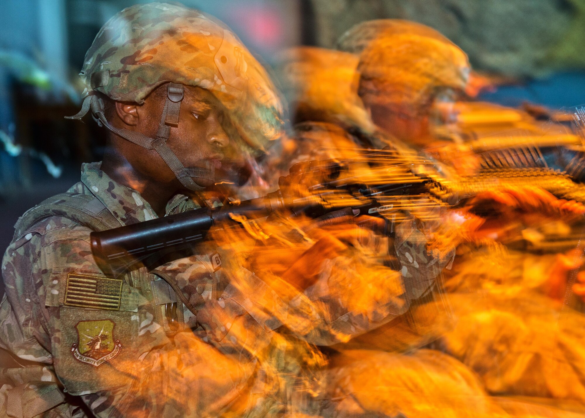 A defender from the 91st Security Forces Group prepares to fire at the indoor U.S. Army training simulator at Camp Grafton Training Center, N.D., Sept. 7, 2016. Throughout August and September, various units within the 91st SFG completed combat capability assurance training at the Camp Grafton Training Center. (U.S. Air Force photo/Airman 1st Class J.T. Armstrong)