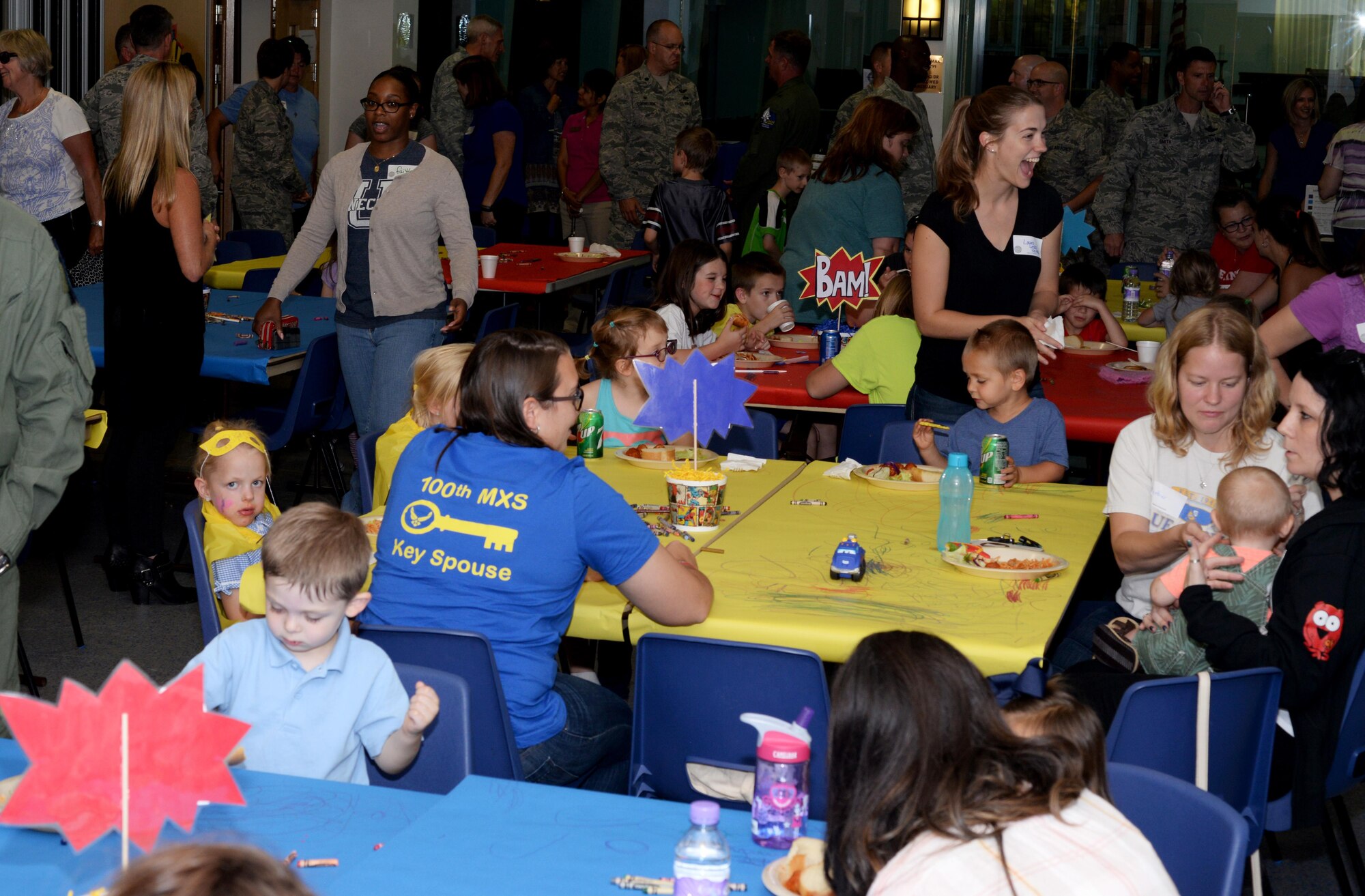 Team Mildenhall Airmen, spouses and children socialize at a Hearts Apart event Sept. 8, 2016, on RAF Mildenhall. The monthly Hearts Apart dinners are a way for spouses and family members of deployed Airmen to gather together and connect. (U.S. Air Force photo by Airman 1st Class Tenley Long)